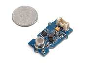 Grove Air Quality Sensor v1.3 top side view with size comparison to a coin