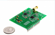 DV Dual Band Radio Shield size comparison to a coin