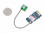 Grove GPS Module top view with size comparison to a coin